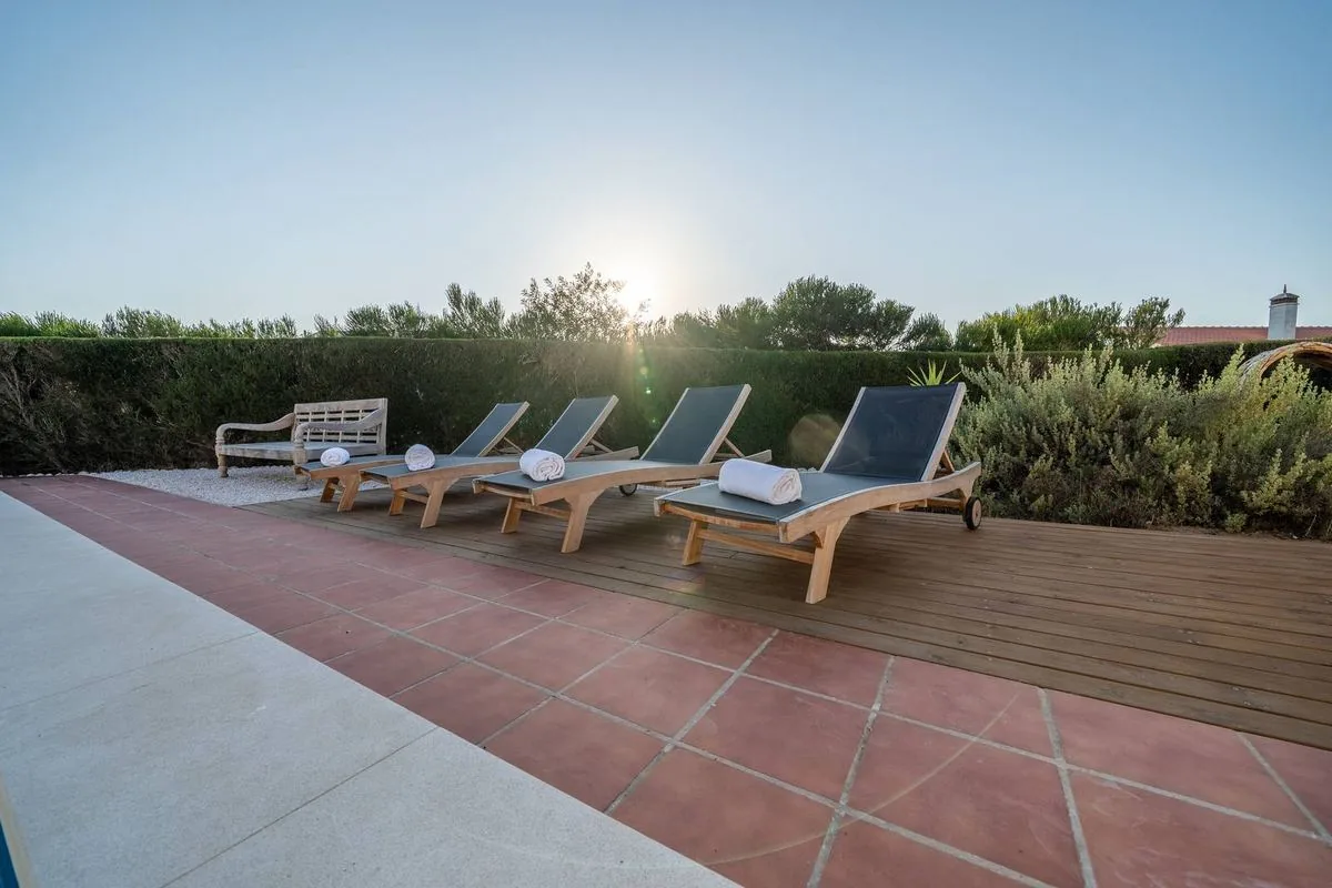Sunbeds at sunset